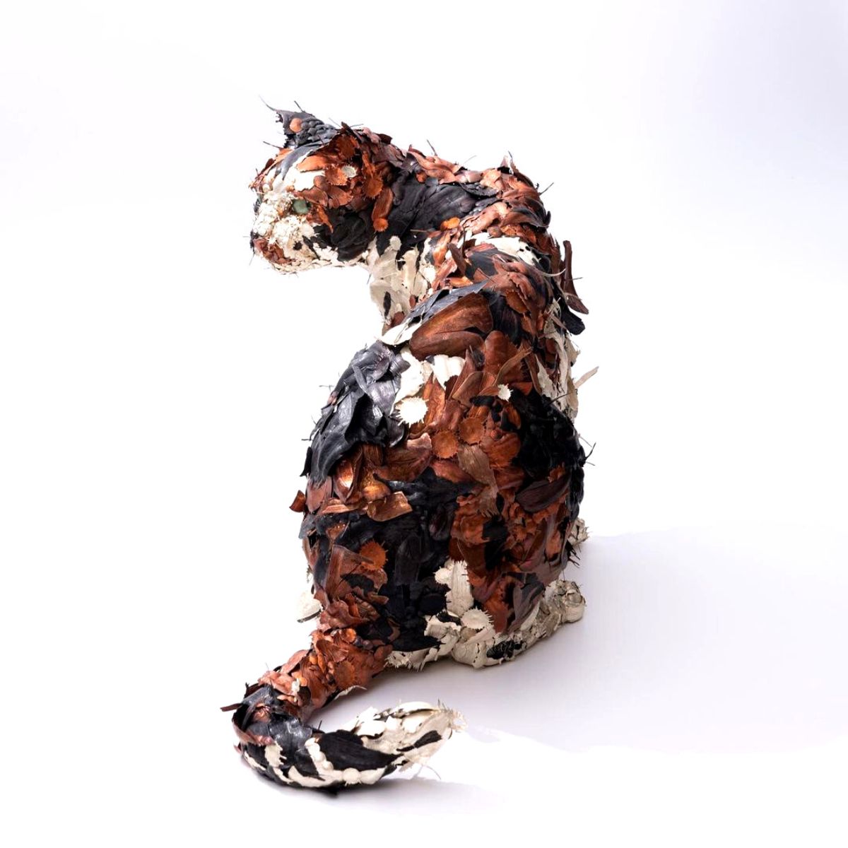 Animal sculptures made from metallic flowers cat on Thursd