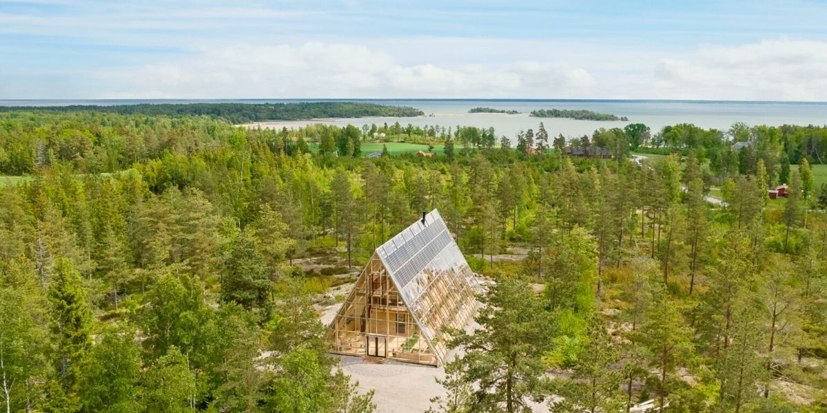 This A Shaped house is situated between conifers in Sweden on Thursd