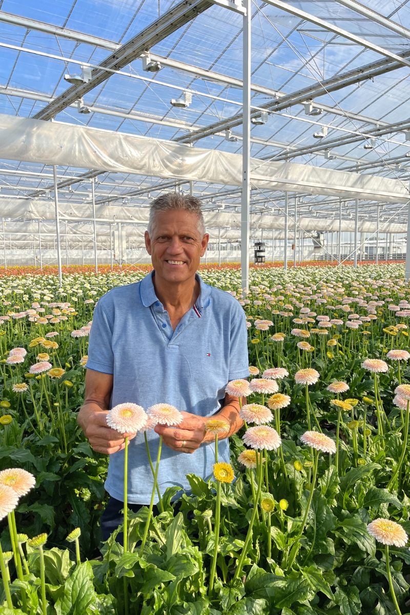 Leo Holstein in His Greenhouse at Holstein Flowers on Thursd