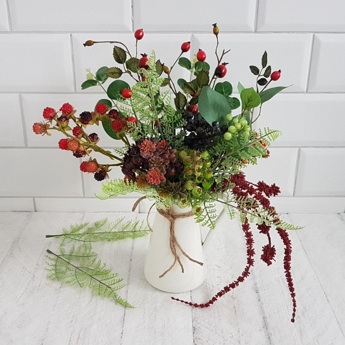 Rose hip works as a great filler for arrangements on Thursd