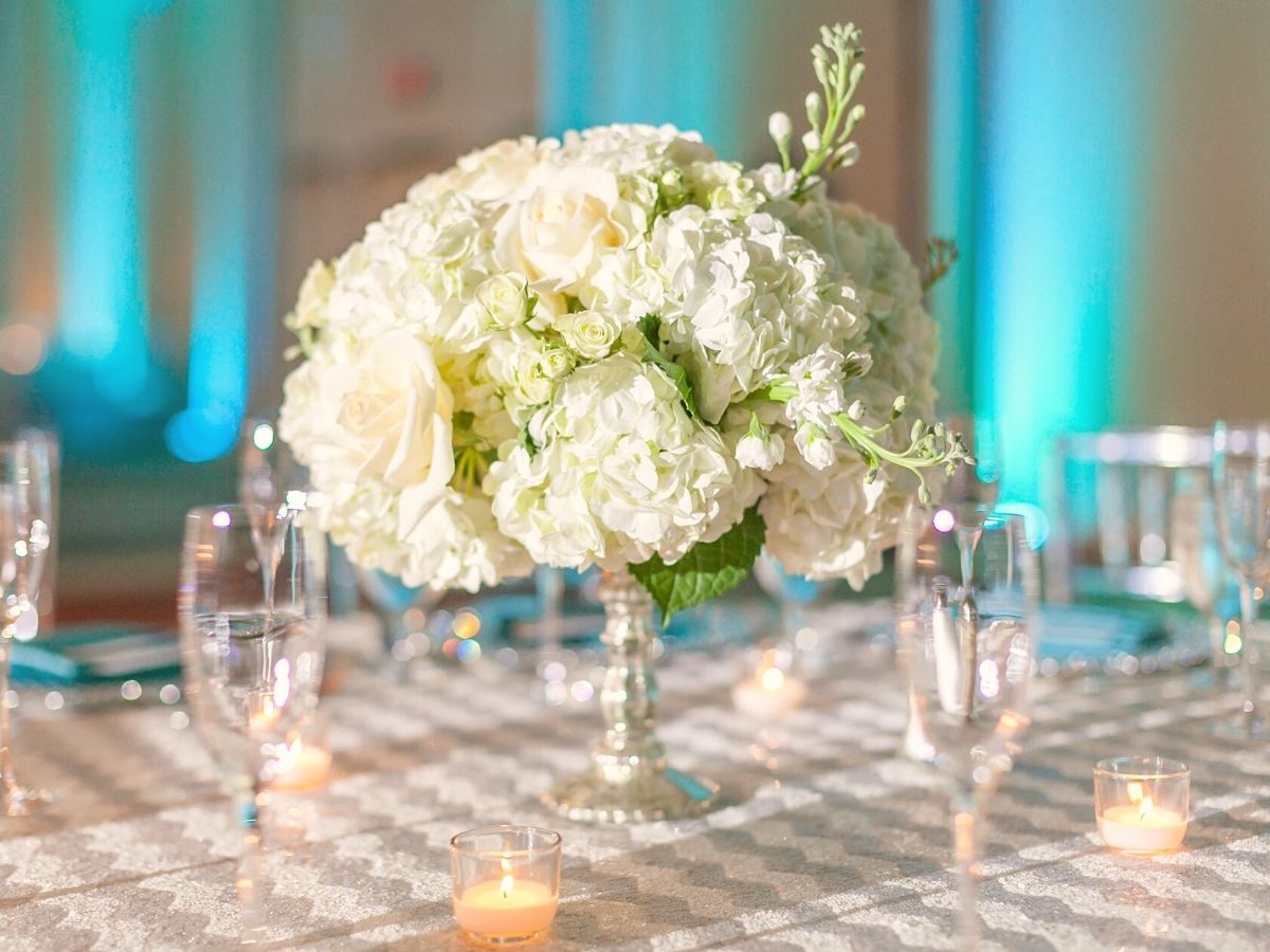 Hydrangeas can be paired with roses and peonies for wedding decor on Thursd