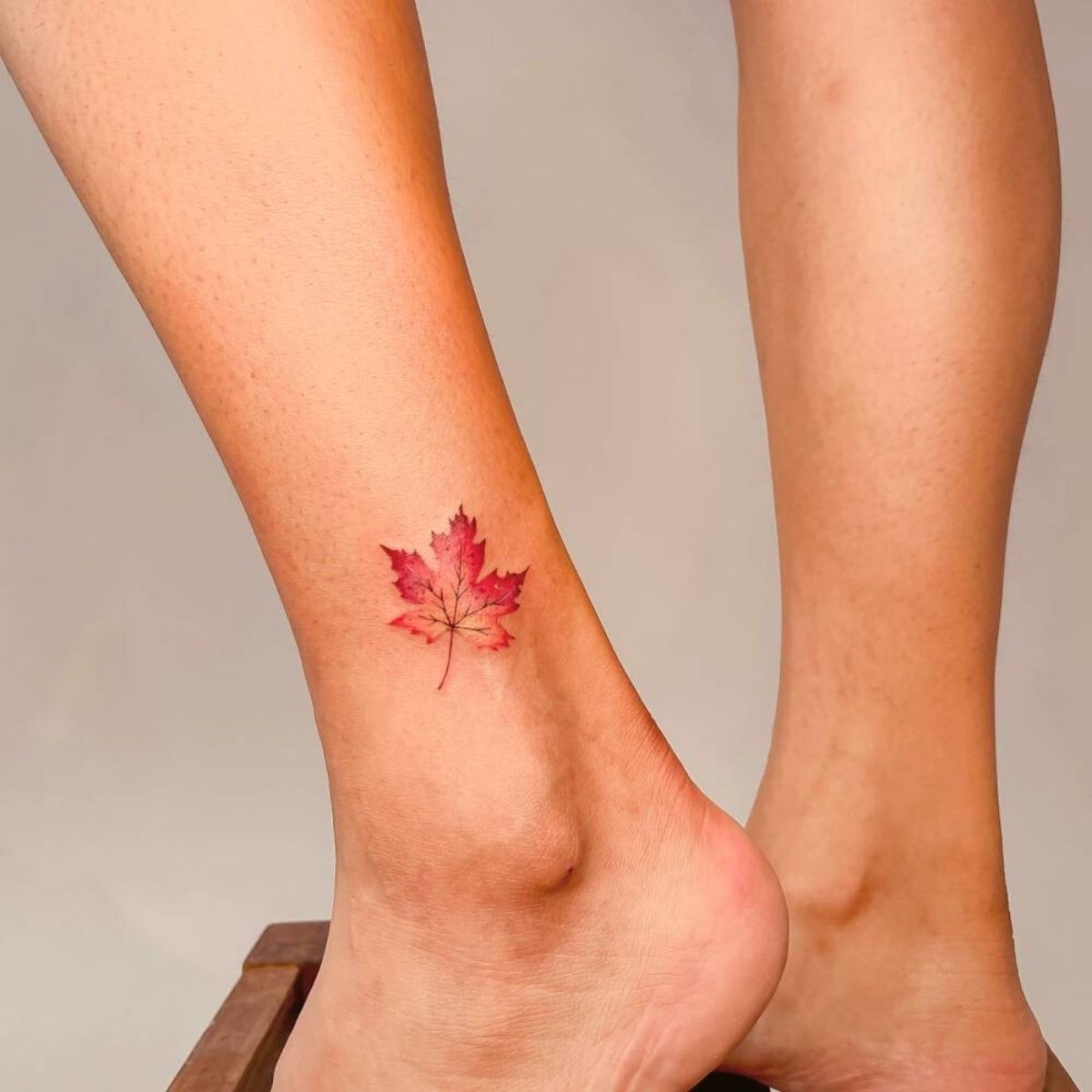 A small branch with two leaves tattoo on the right inner arm | Tattoos,  Tattoo designs and meanings, Wolf tattoo design