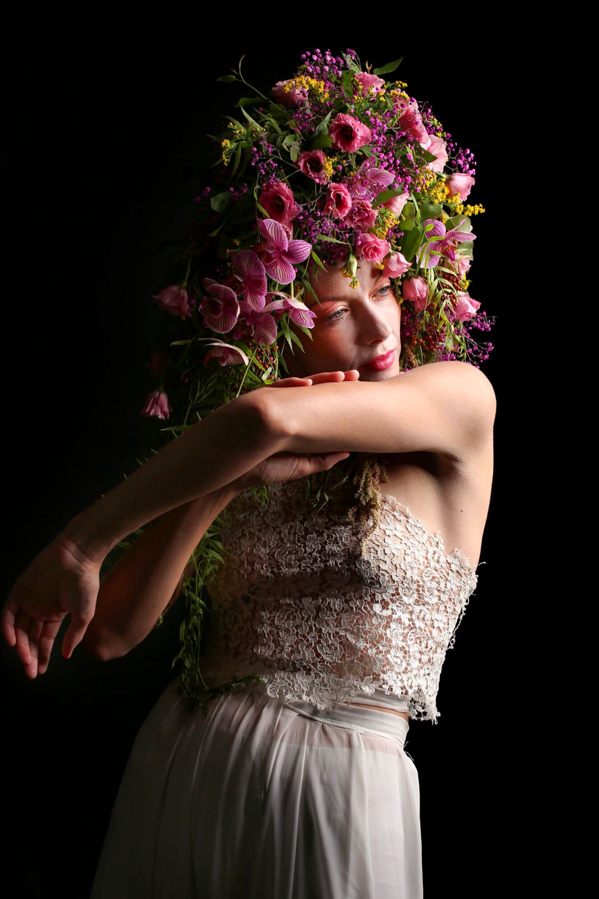 Model With Headpiece in Pinks and Greens and a Touch of Yellow on Thursd