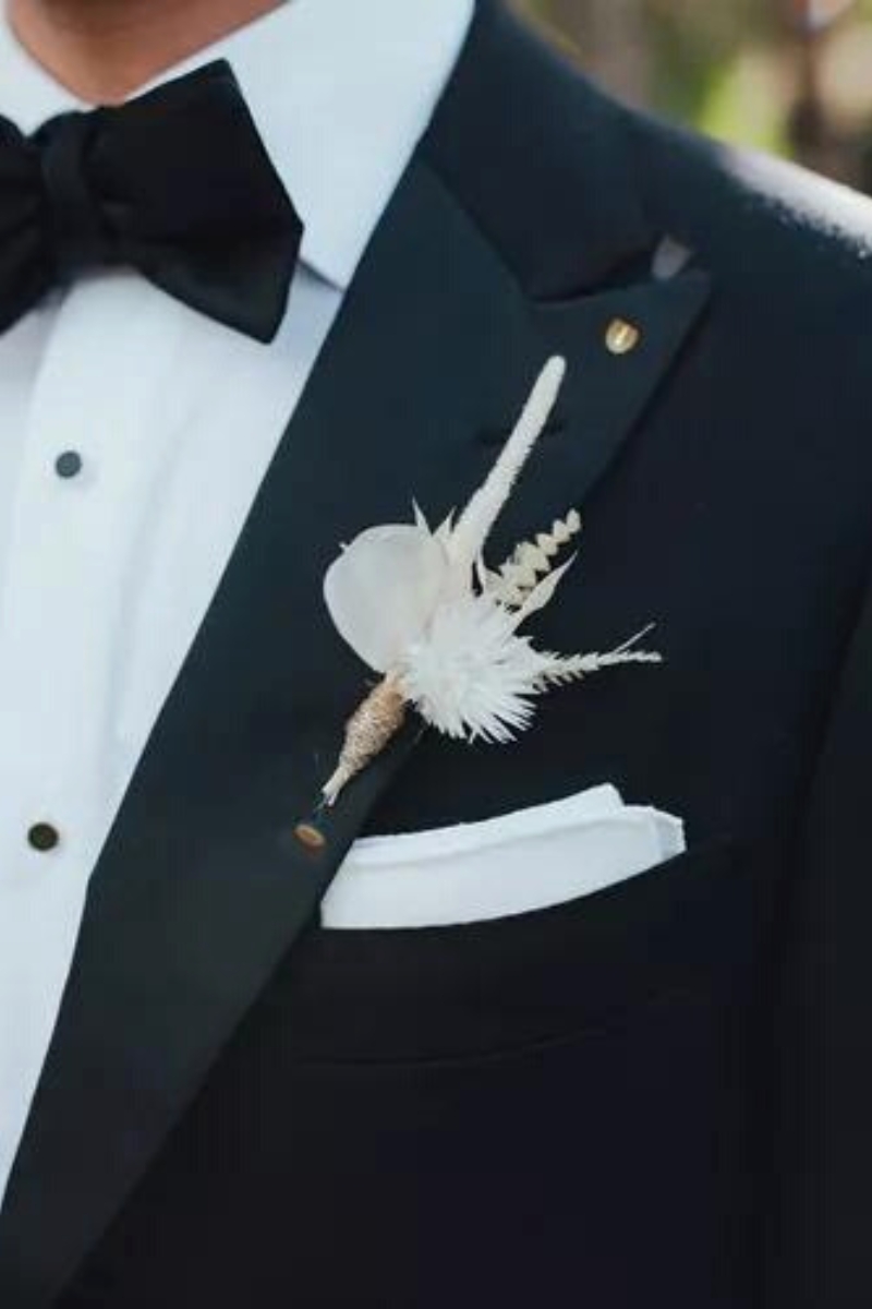 Dried grasses and chrysanth wedding boutonniere on Thursd