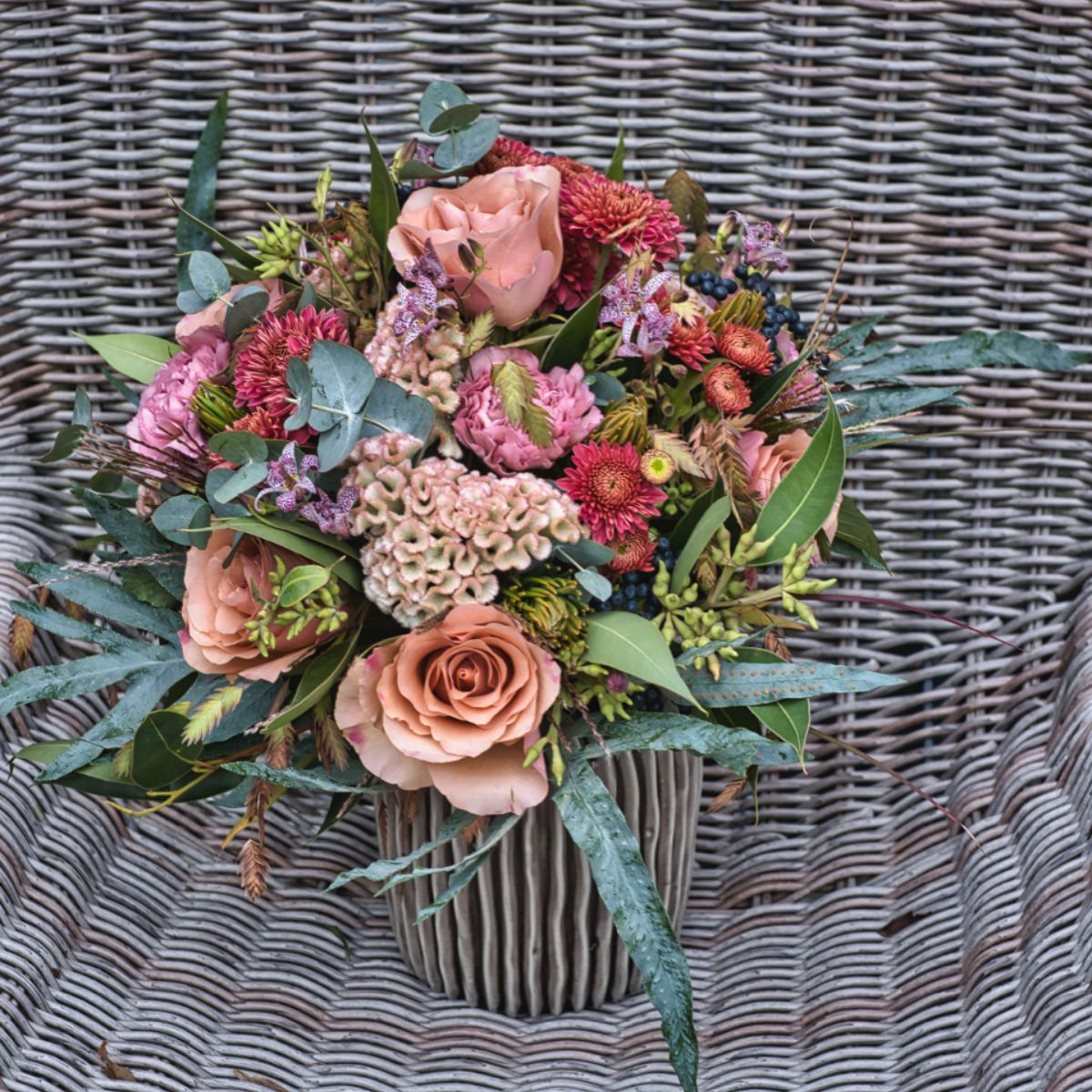 Florist Erko Feigl makes arrangement with Rose Moccachino