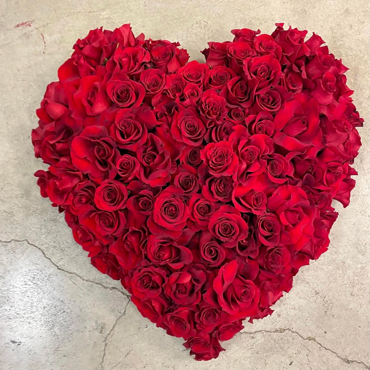 Red roses in heart shape is the most popular and romantic flower for vday