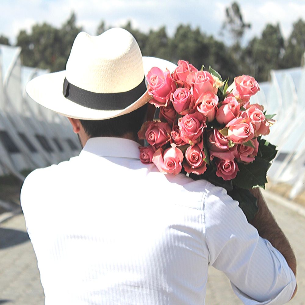 Man holding roses at EQR Roses