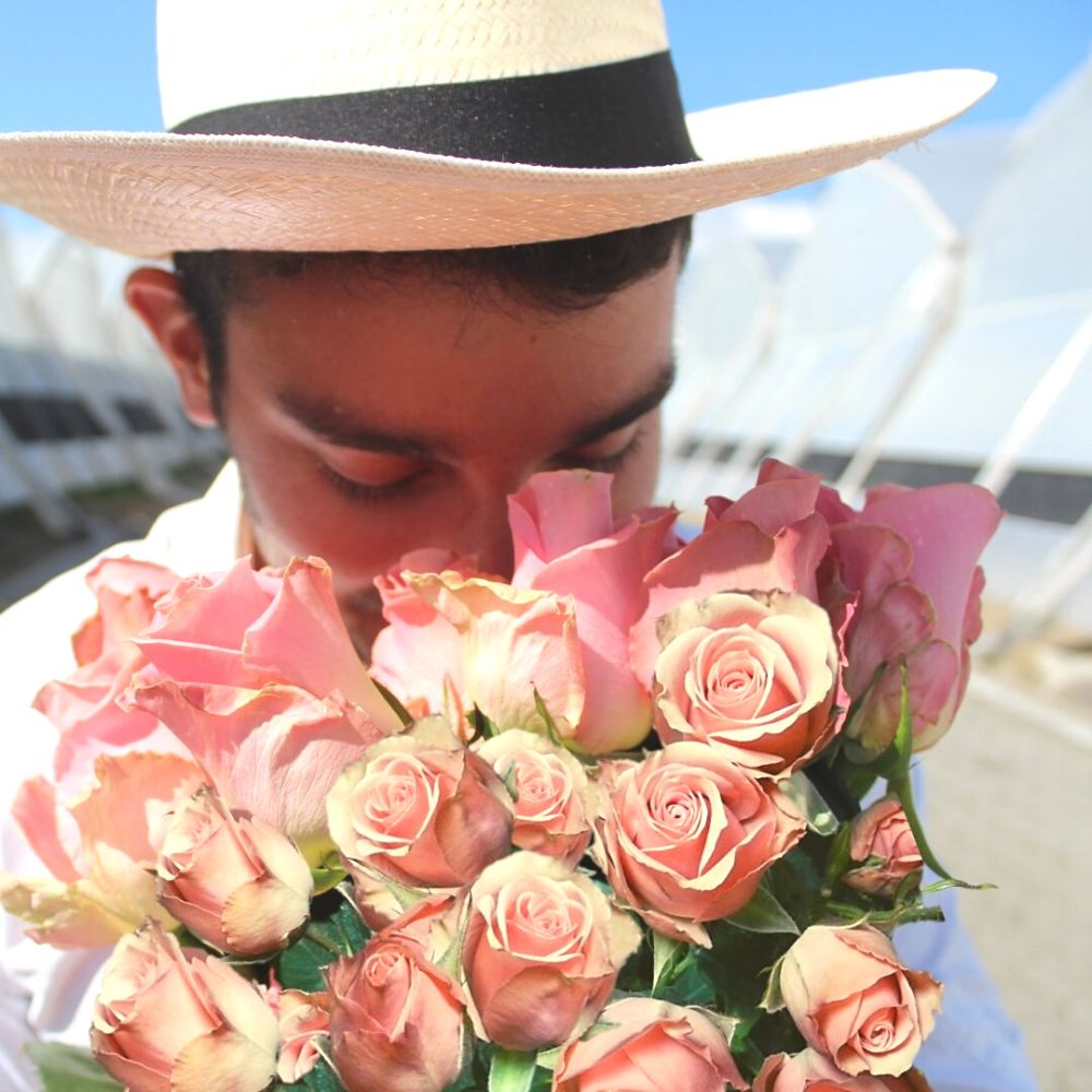 Man smelling Ecuador roses for valentine's at EQR Roses