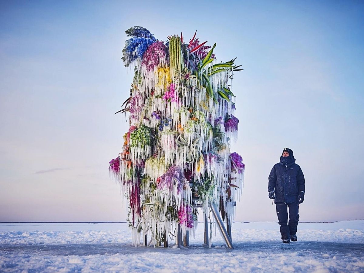 Azuma Makoto in snow coated lake