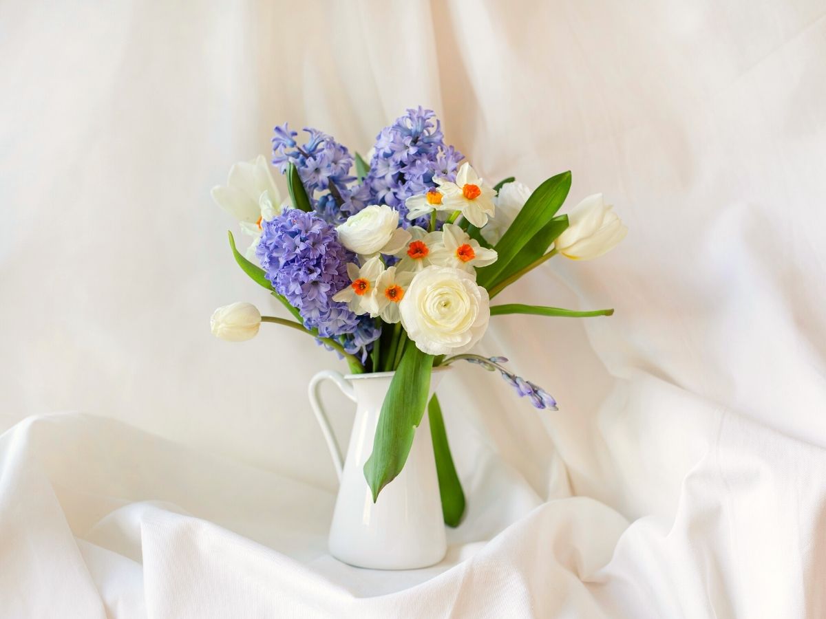 Hyacinth flowers mixed with other blooms in arrangement