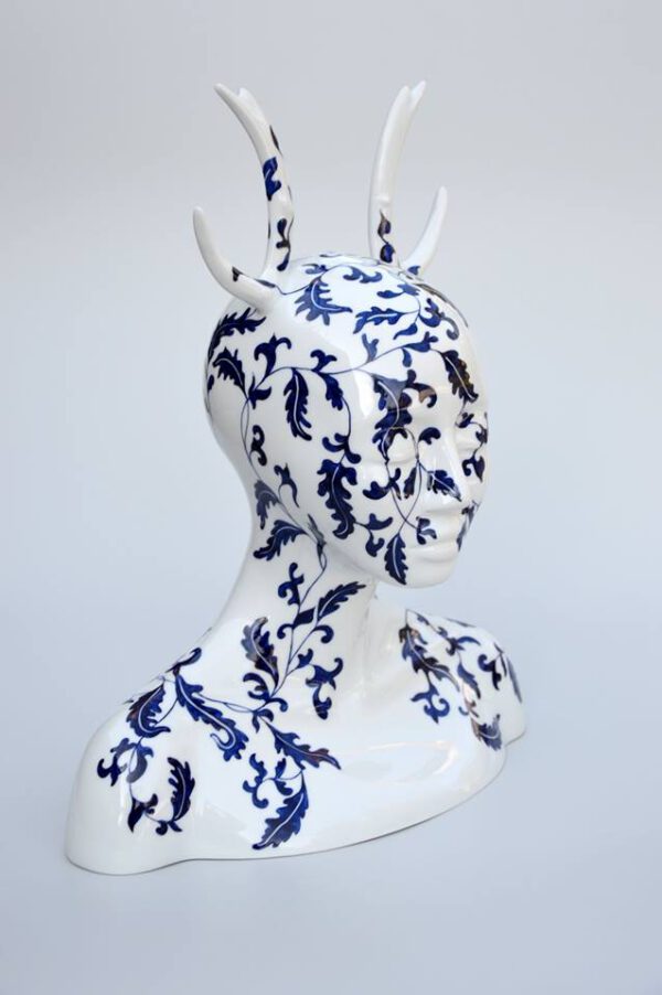 Contemporary Flower-Faced Sculptures That Shape the Future of Ceramics - dutch blue flower painted deer sculpture - juliette clovis - on thursd