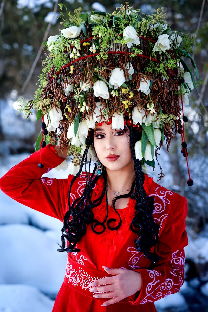 Snowy photos with white tulips in Kyrgyzstan mountains