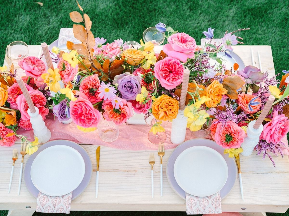 A pink rose table setting by Dawn Weisberg floral designer