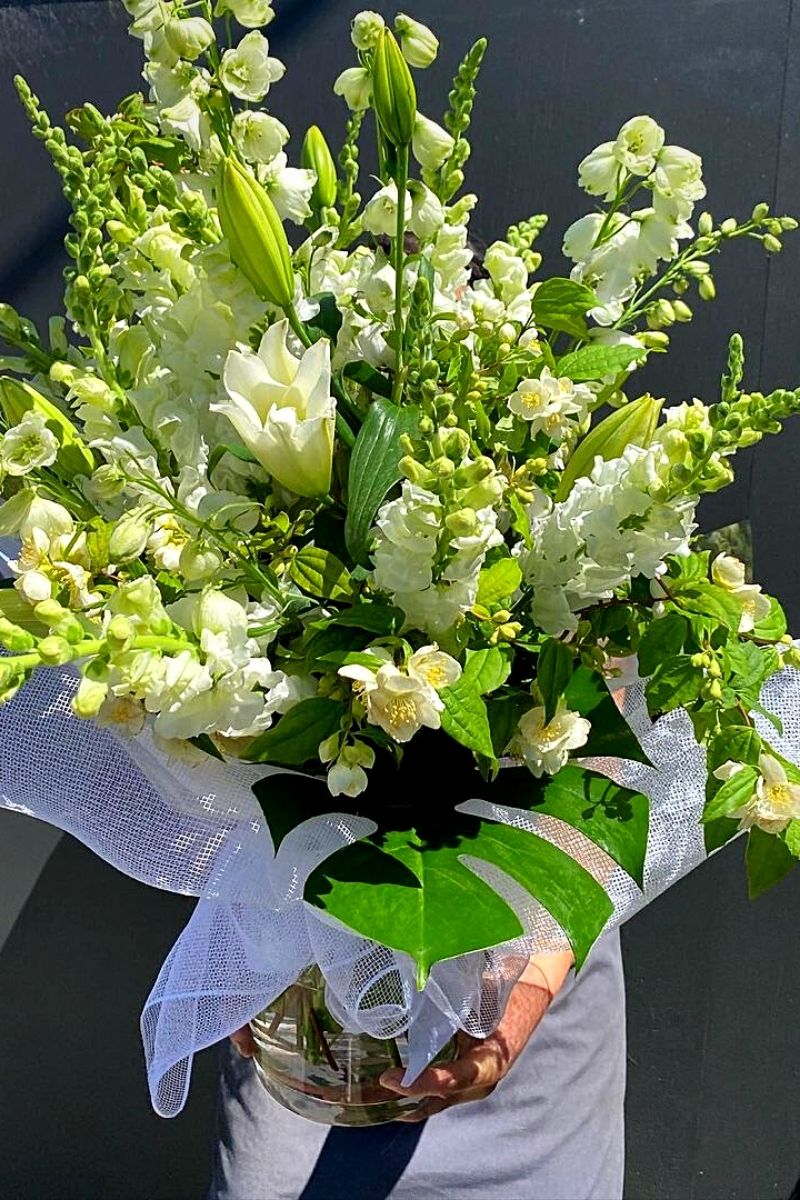 Bouquet of different flowers with hawthorns used as accent flowers