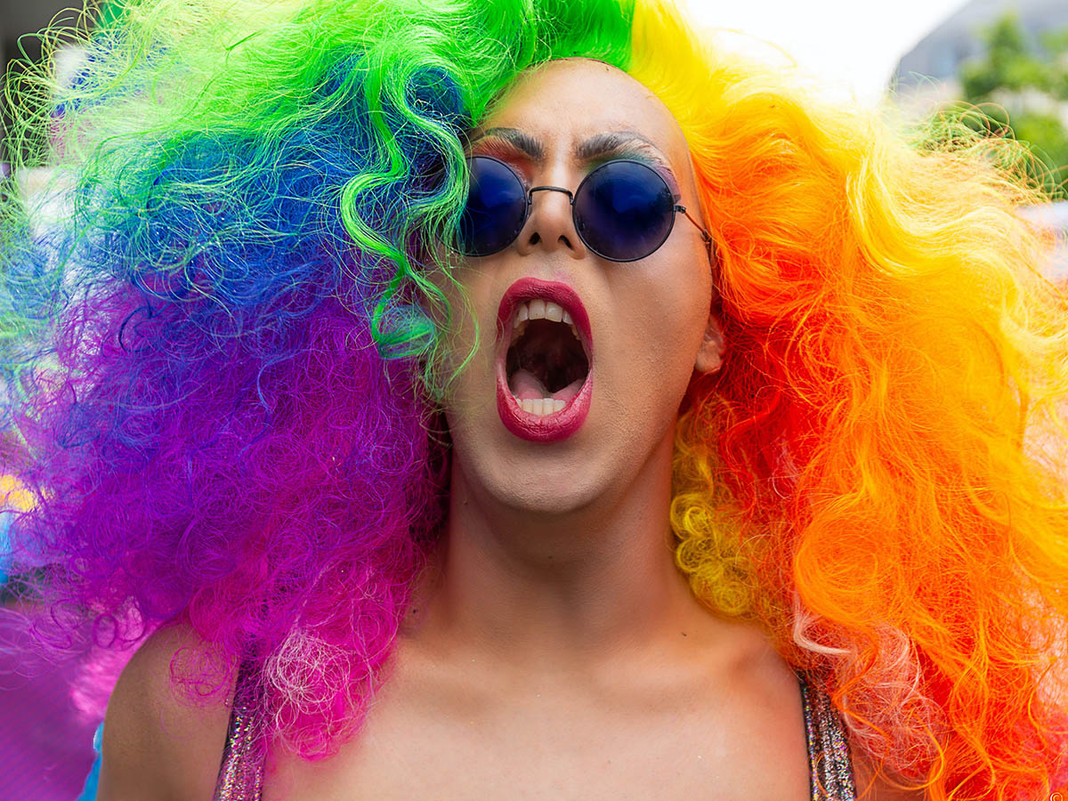 Pride girl with rainbow hair on Thursd