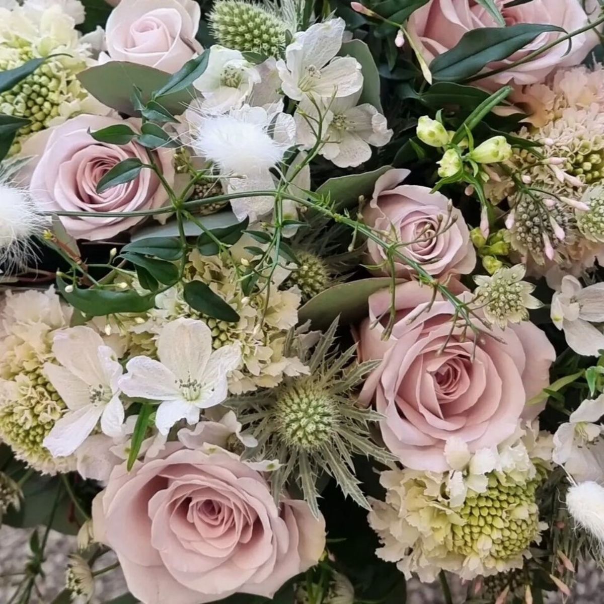 Flower arrangements featuring Rose La Vida Loca