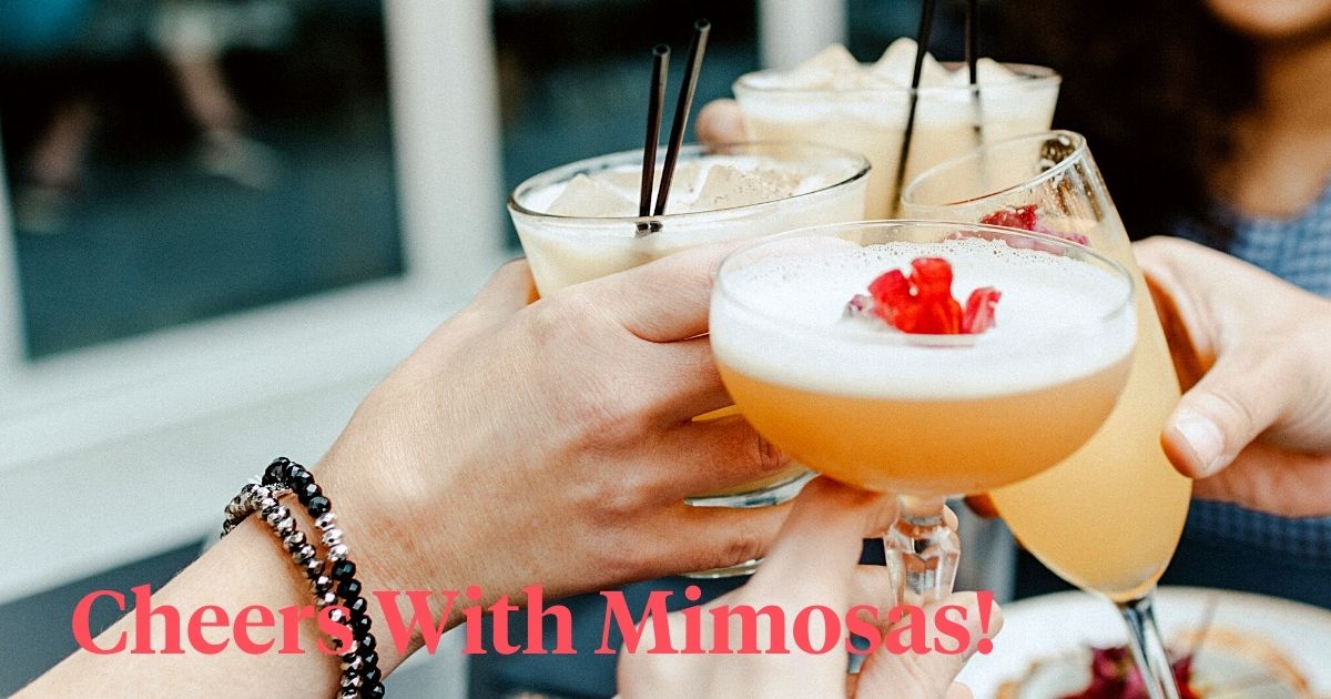 Cheers with Mimosa drinks header