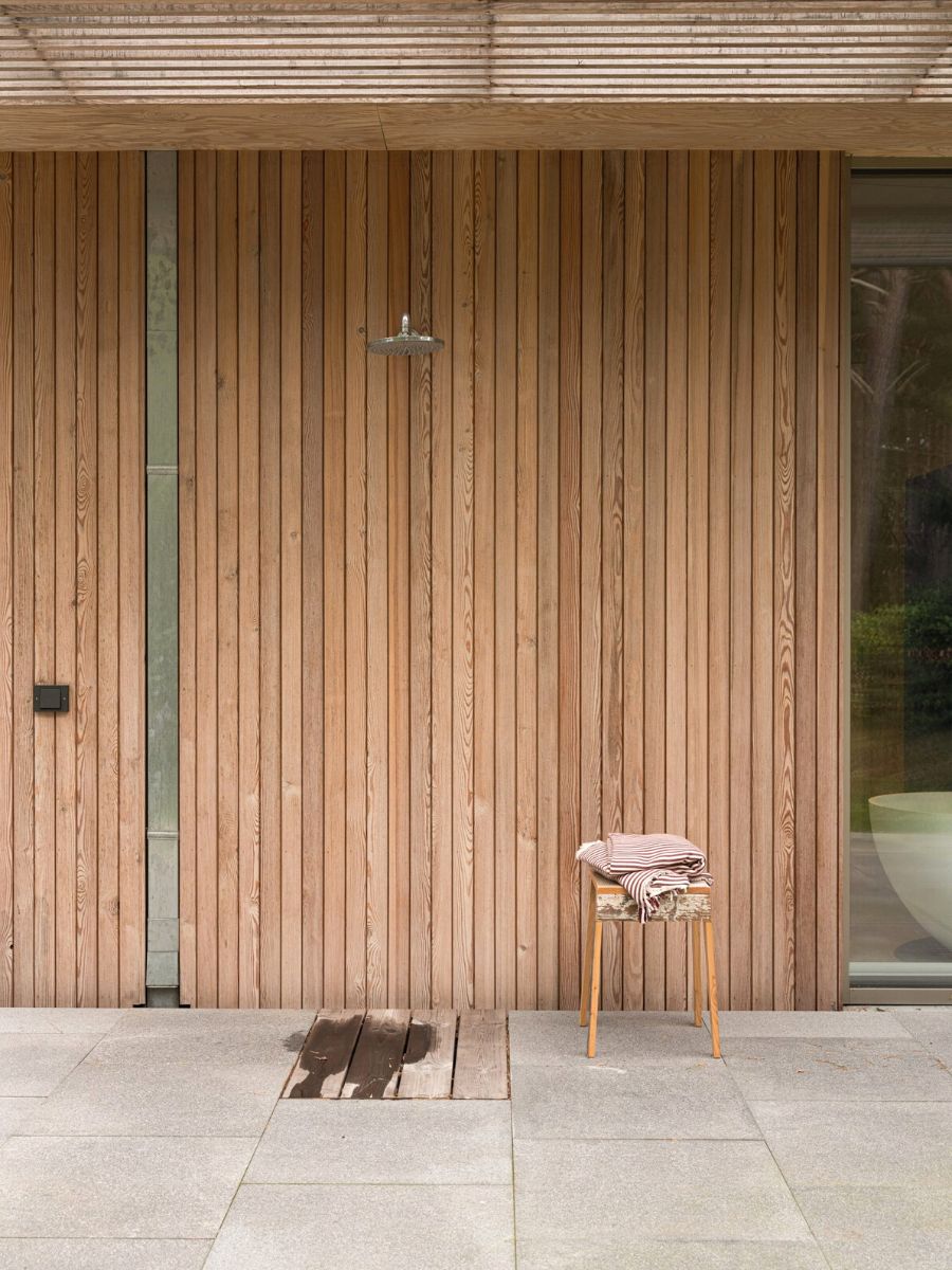 Wooden outdoor shower in Sweden