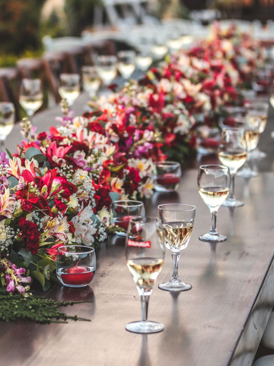 Colorful flowers decorate a centertable at a wedding