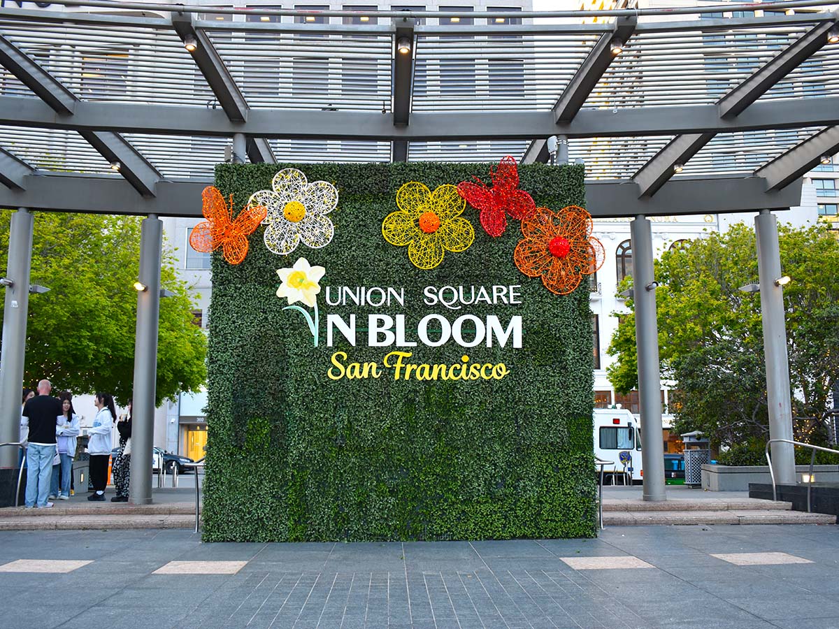 Union Square in Bloom green logo