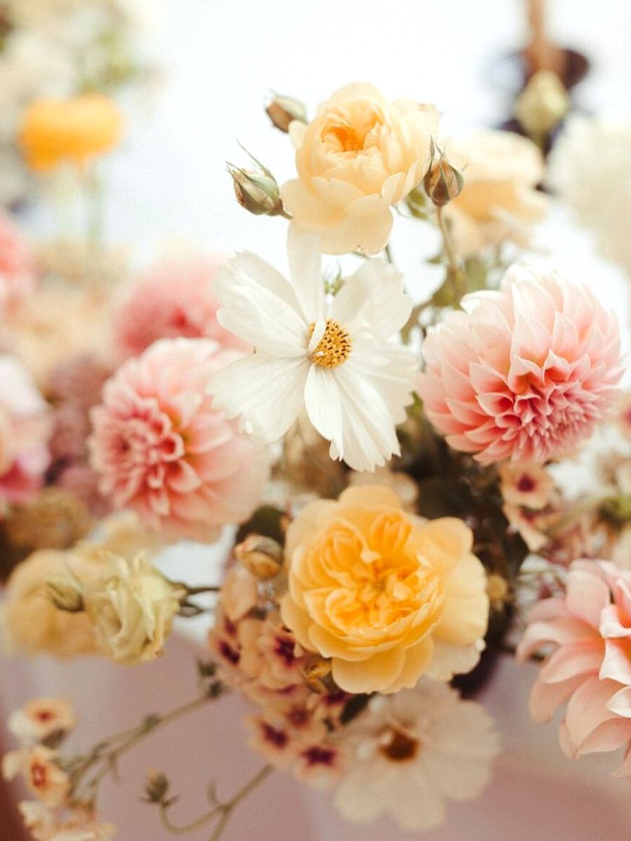 Beautiful floral arrangement in light colors by Kate Rutter