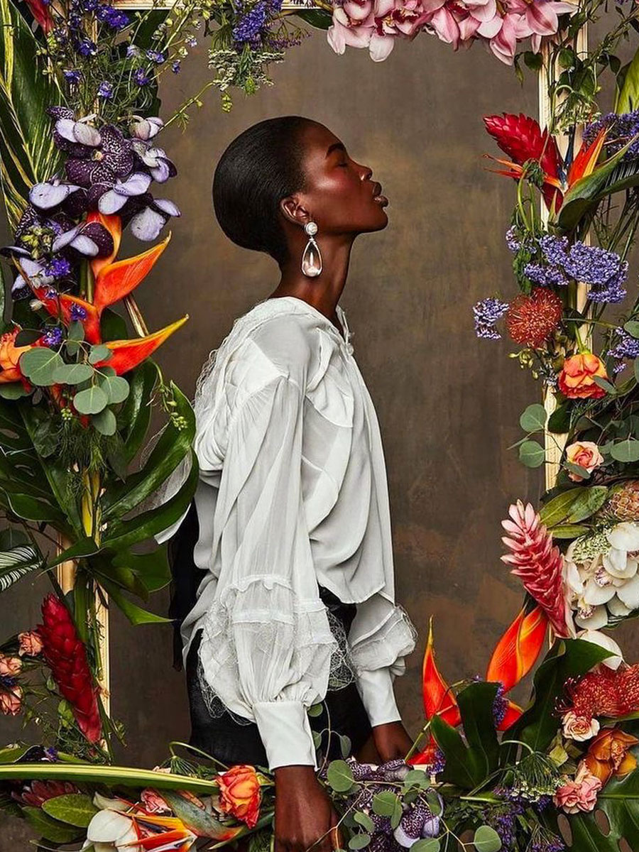 Kenyan woman in flower frame