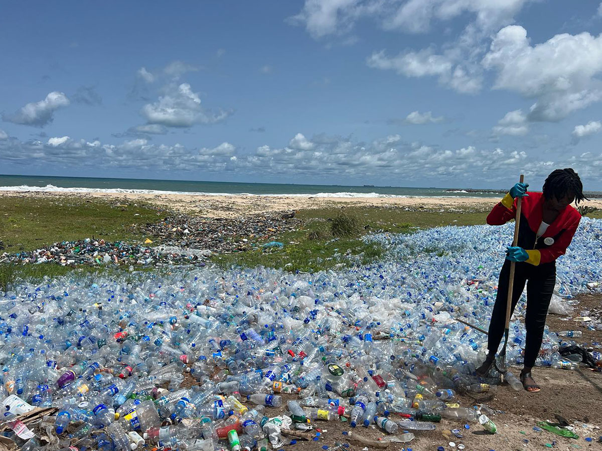 Cleaning plastic from a beach in Nigeria Cleaning plastic from a beach in Nigeria
