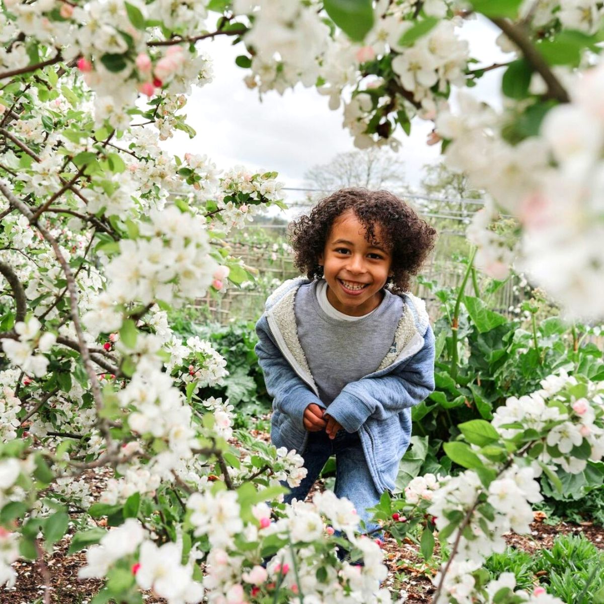 Happy children enjoying the garden spaces