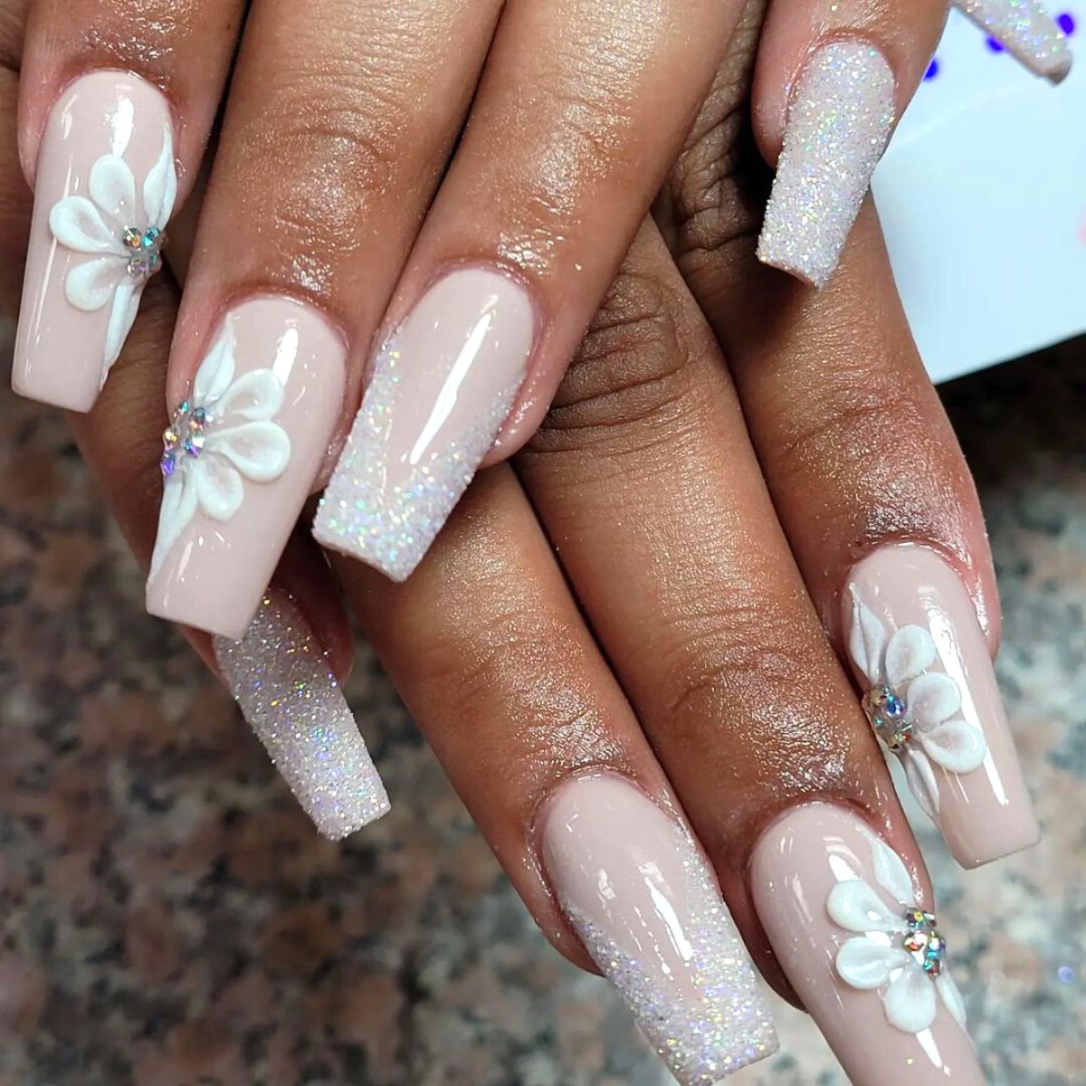 White orchids and glitter nail art