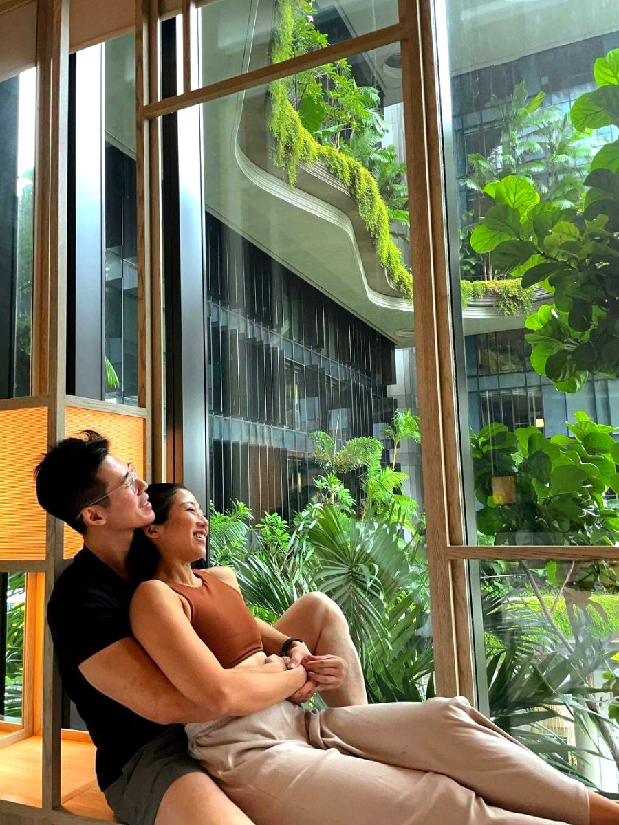 Happy couple surrounded by nature in Parkroyal