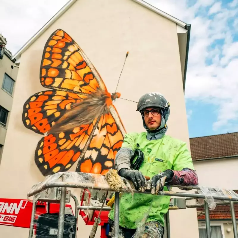 Mantra painting a butterfly mural