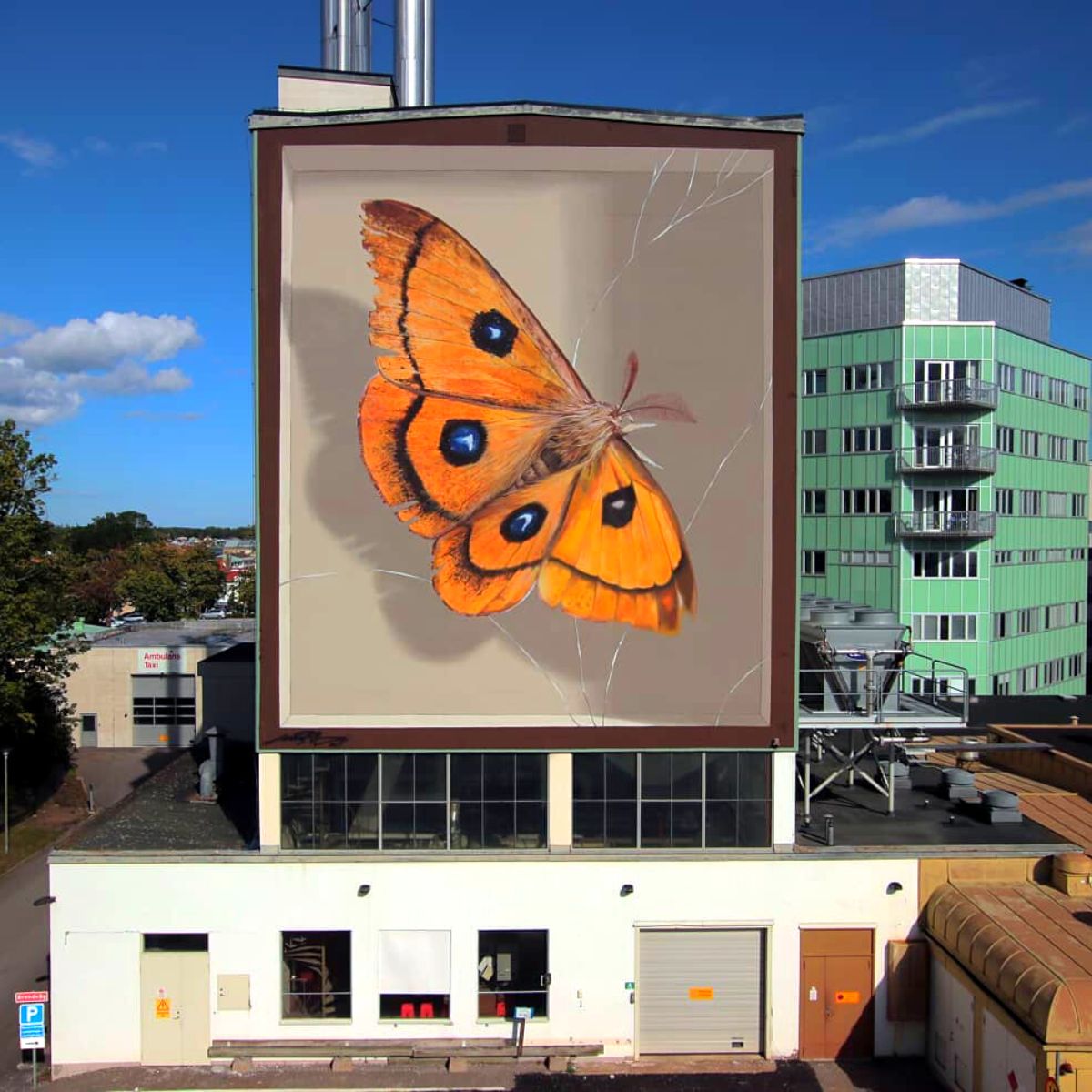 Mantra paints butterfly murals around the world