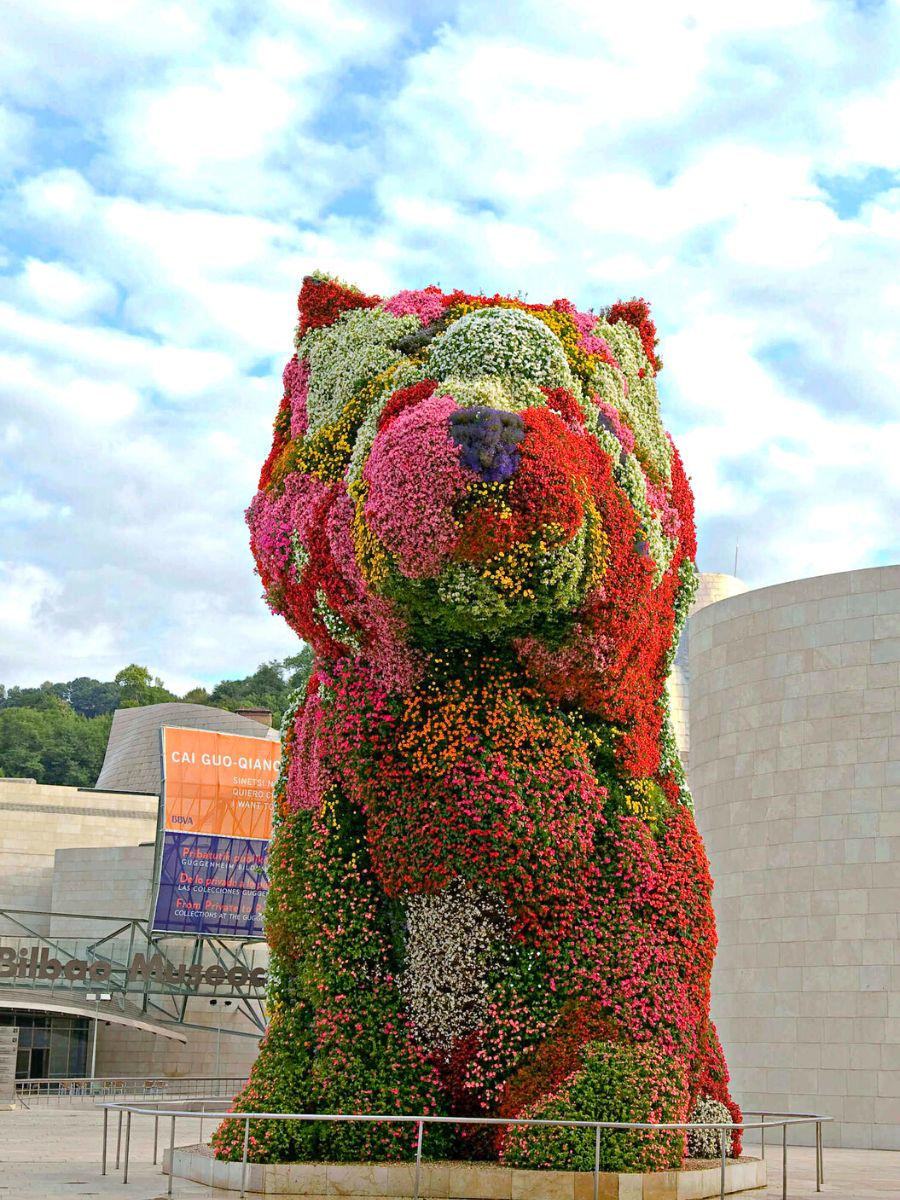 Puppy adorned with thousands of blooms