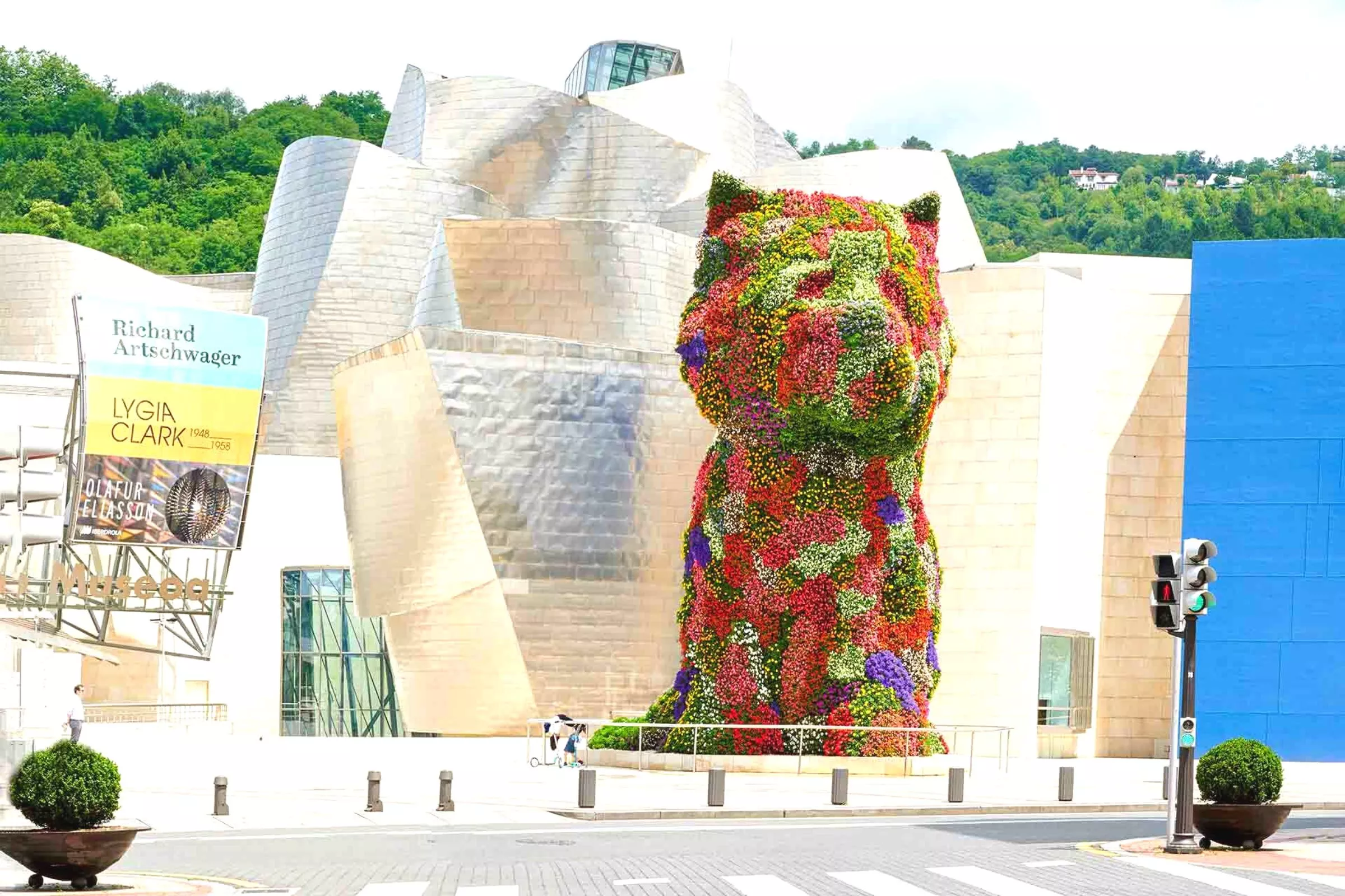 Puppy sculpture with flowers