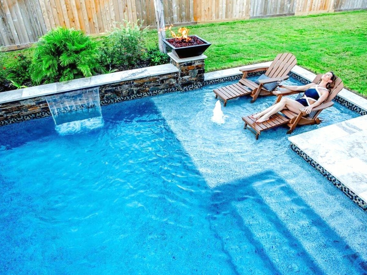 Woman relaxing in her pool