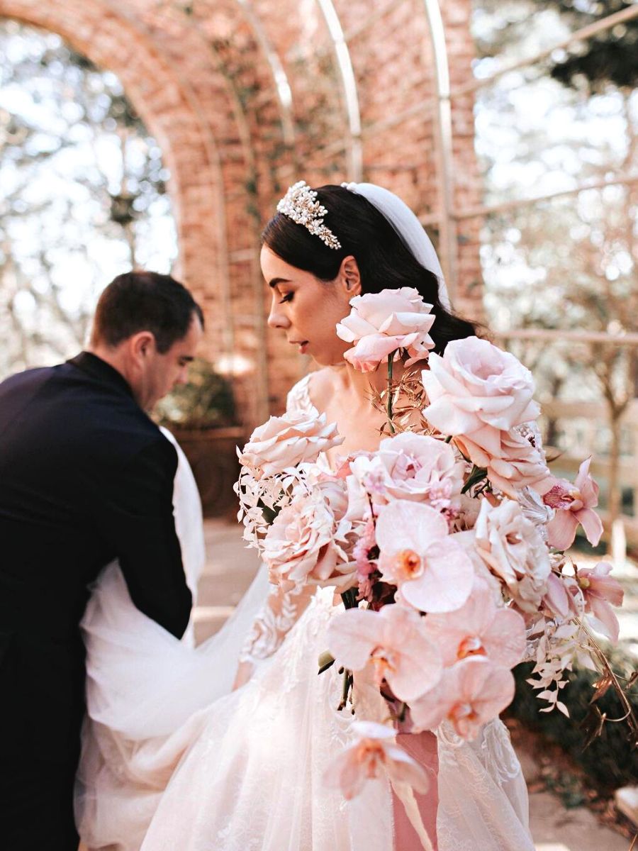 Pink floral decor and wedding bouquet