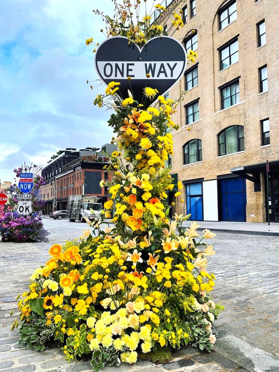 Floral arrangement in one way street sign