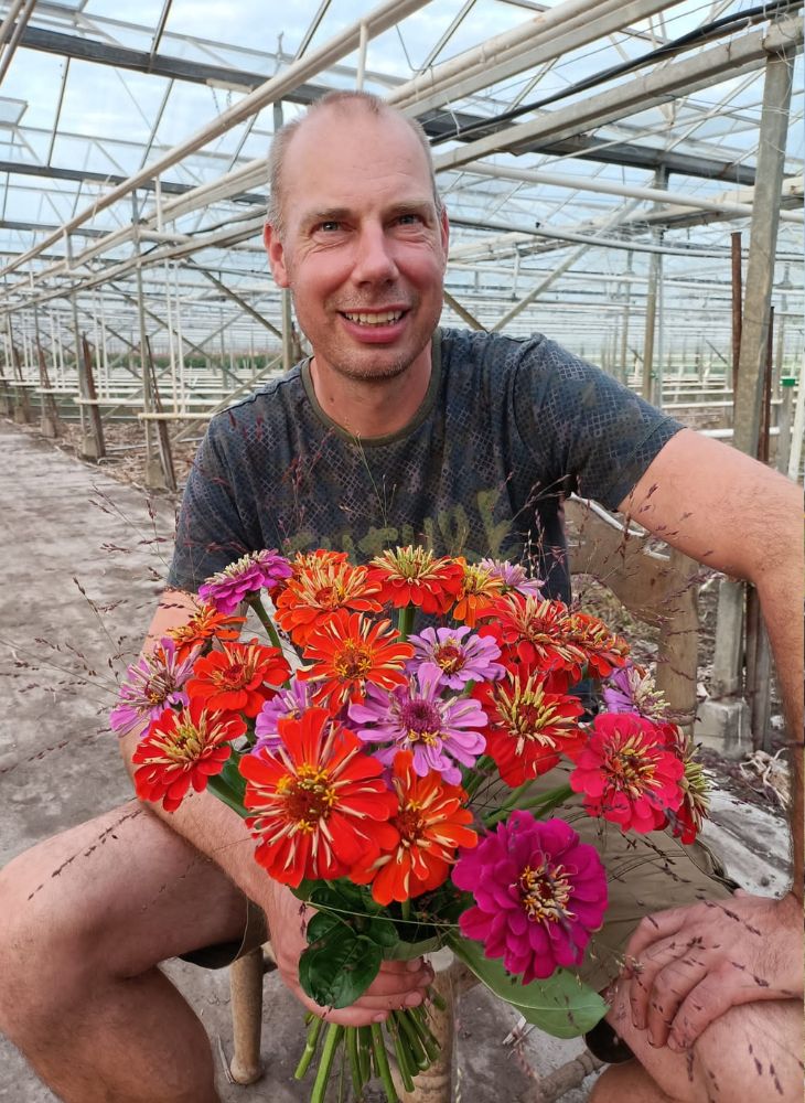 Maurits Keppel With a Bouquet of Zinnias by Petri Rijsdijk 