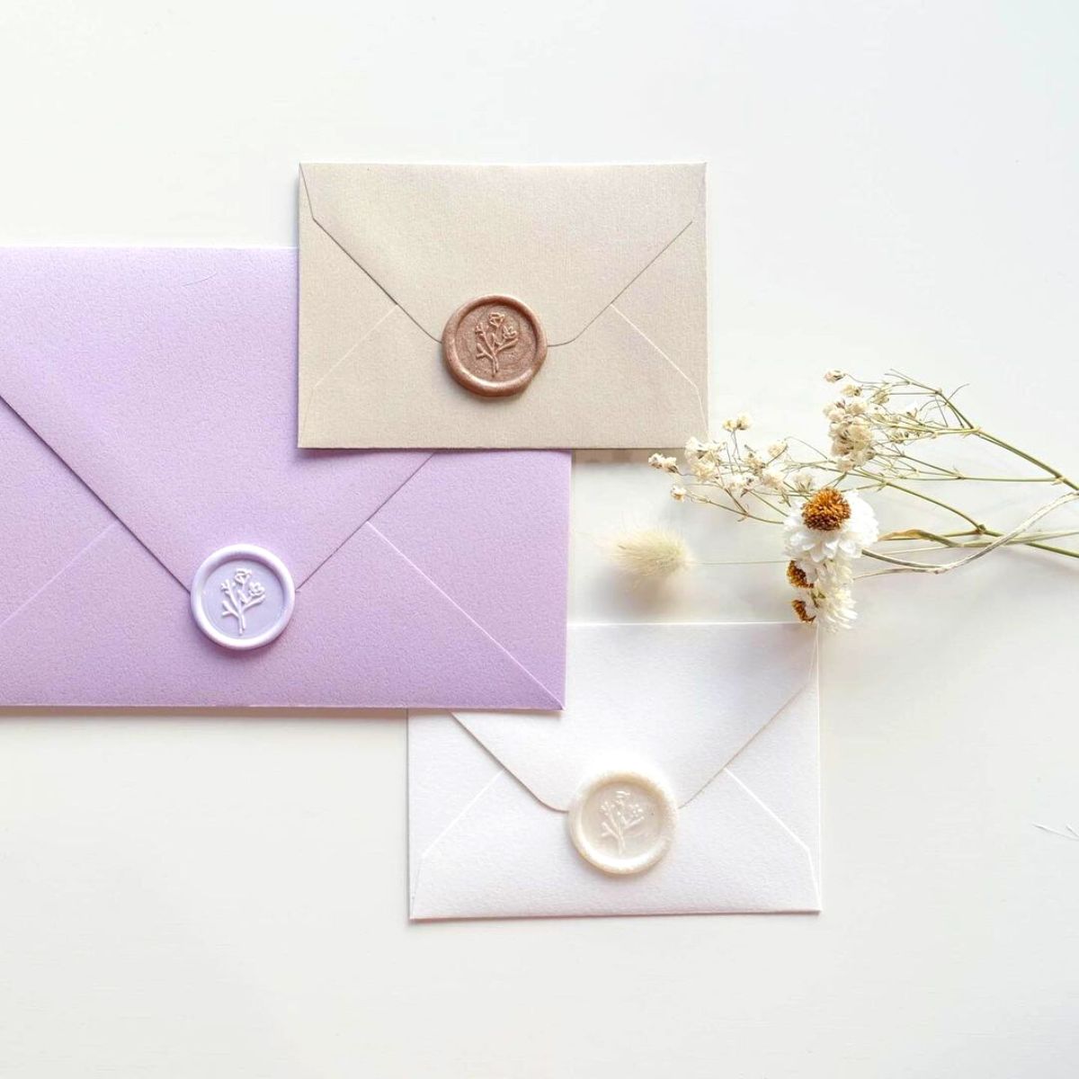 Pastel lavender flower design with wax stamp