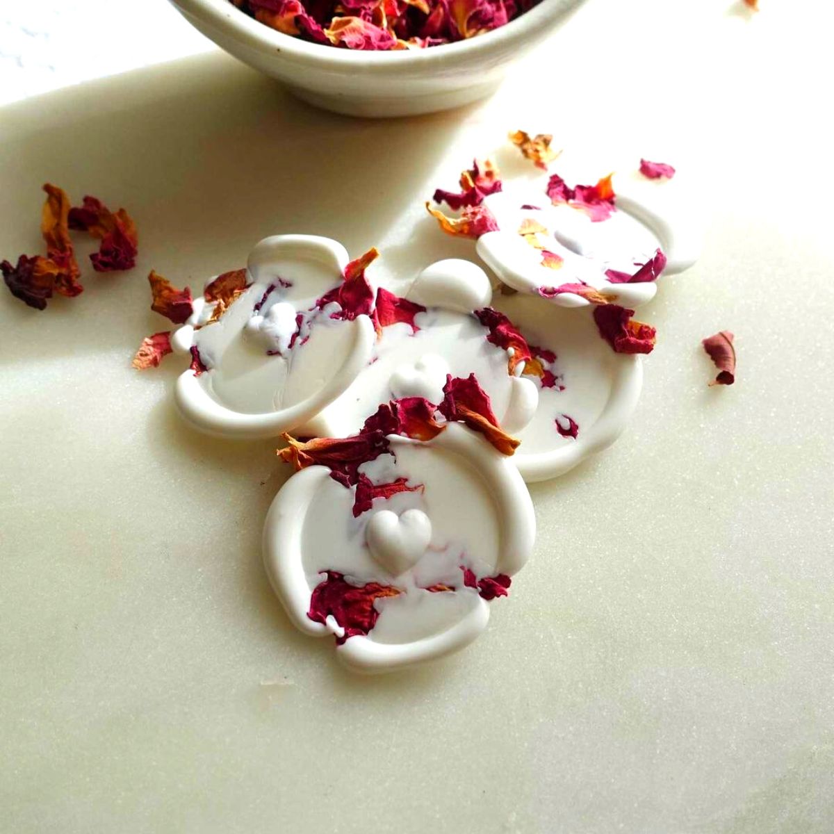 Wax sealing using dried flowers by Fiona Ariva