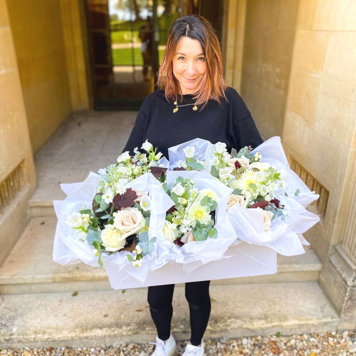 Rachel husband with wedding flowers