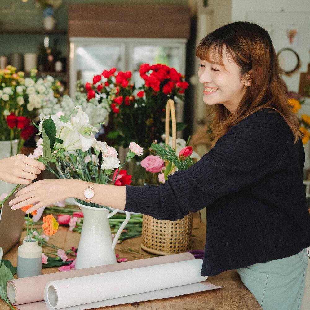 Lady Arranging flowers