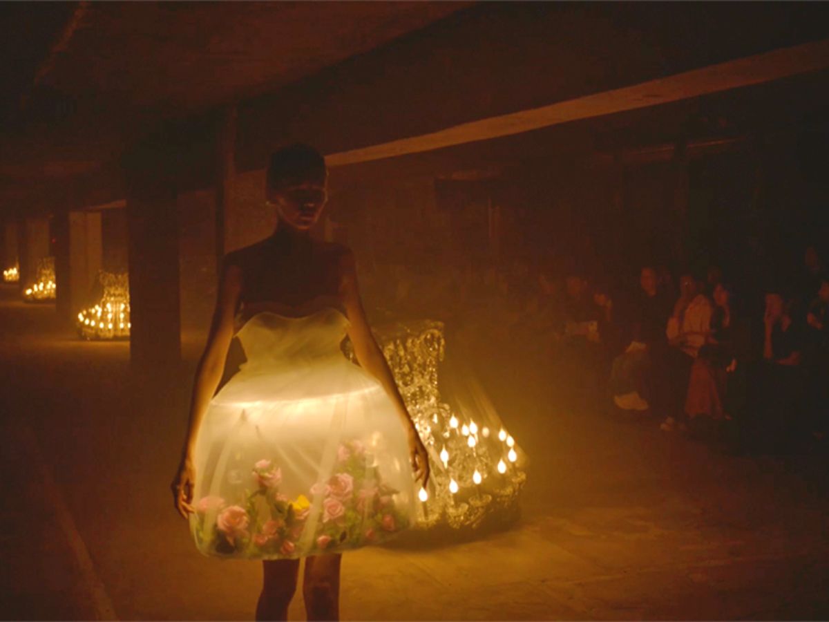 Jun Takahashis Paris Fashion Week runway with flowers