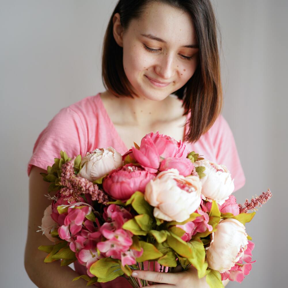 Happy face with flower