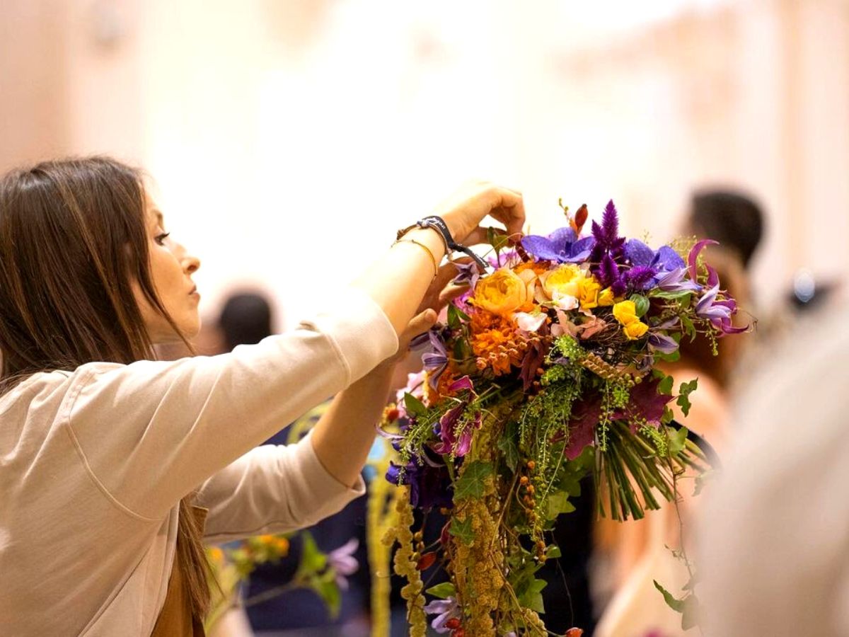 Patricia Aguin working with flowers