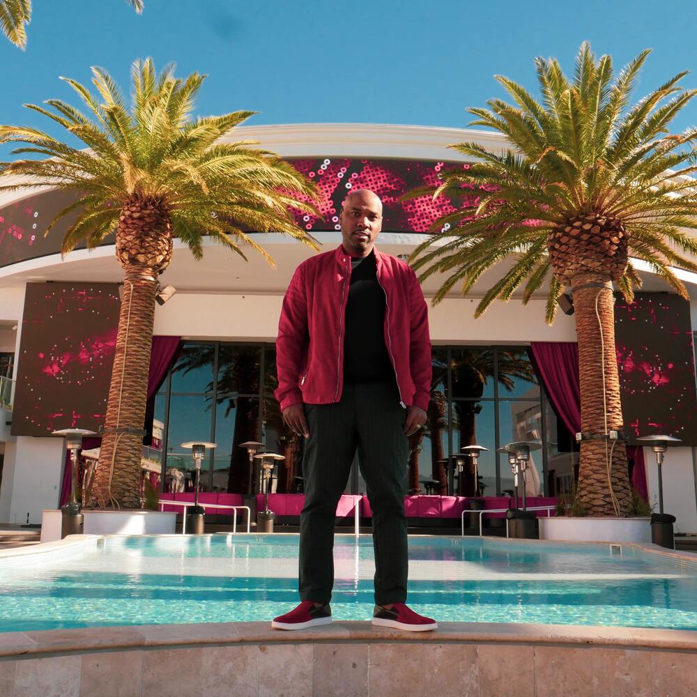 Man standing near pool