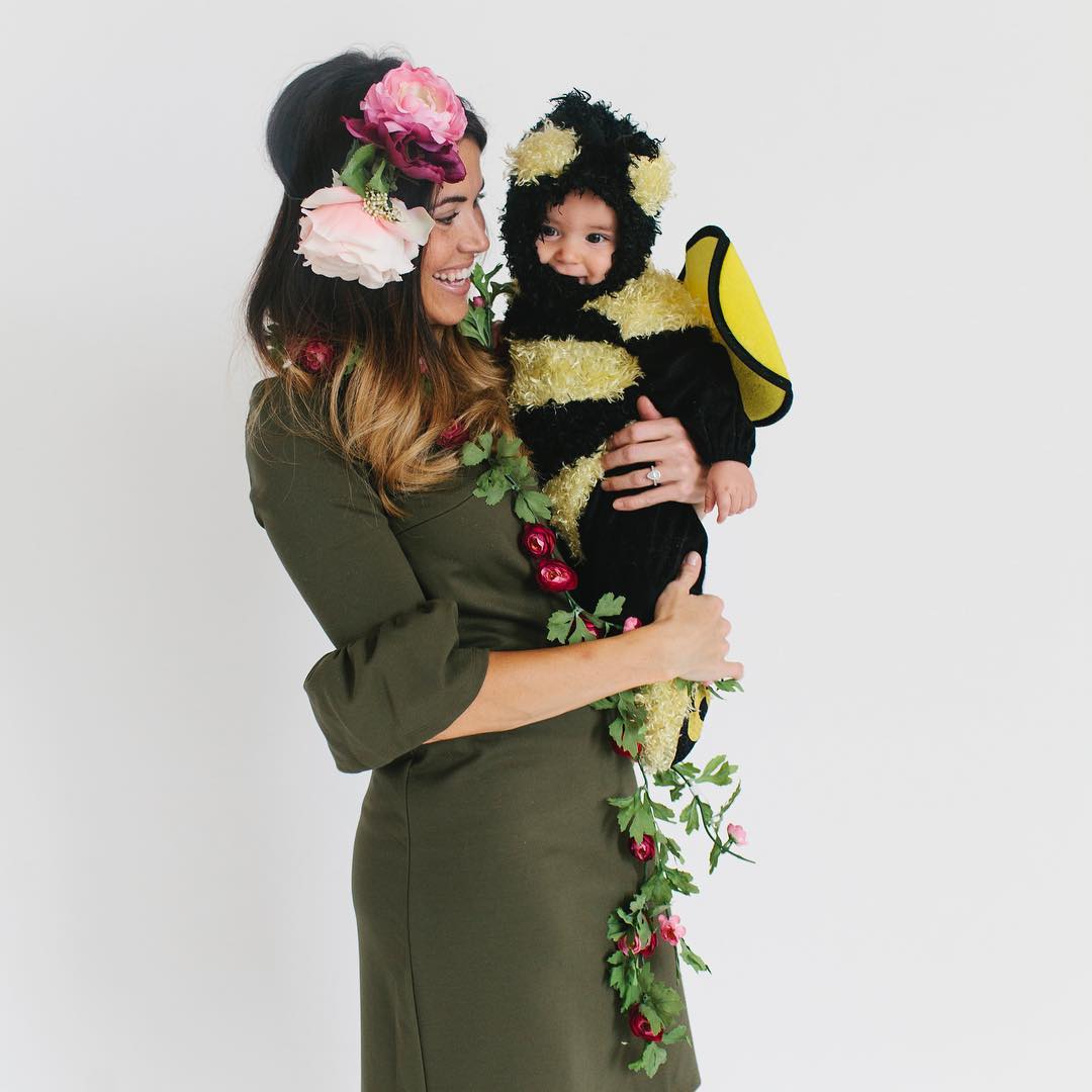 Woman with baby in flower costumes