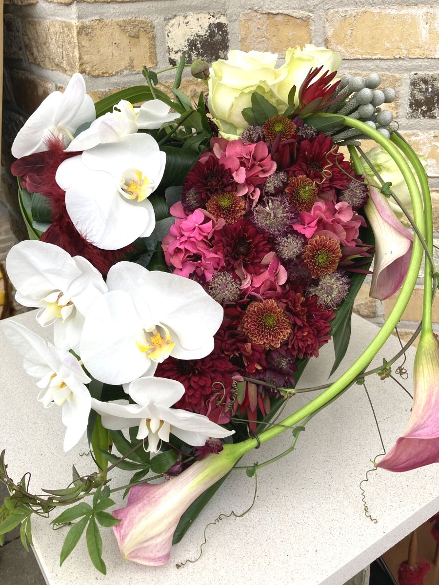 Arrangement with white phalaenopsis