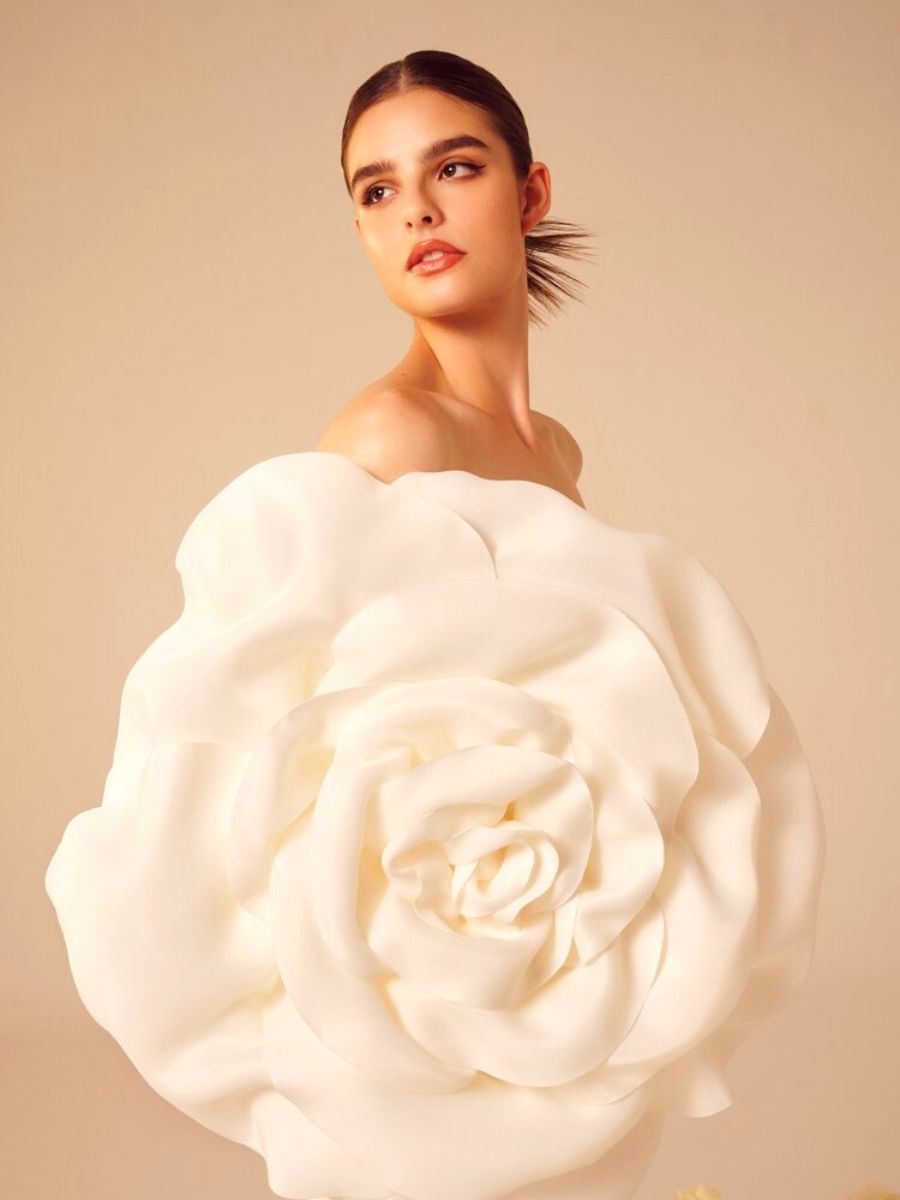 Closeup of giant white flower as protagonist of the dress