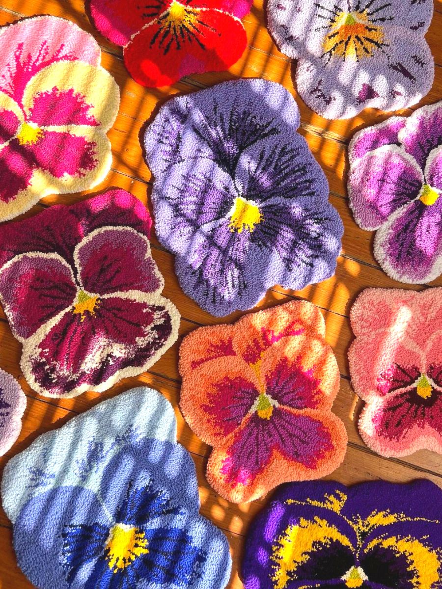 Colorful pansy rugs created by Chelsea Theilmann